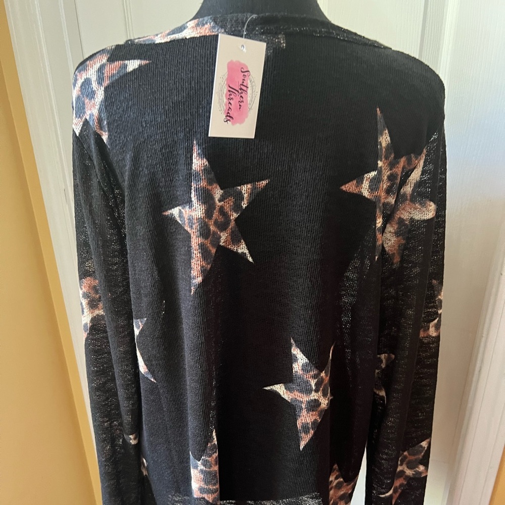 Bibi light weight black sweeter w/ leopard stars. NWT & TTS size L - Picture 2 of 3